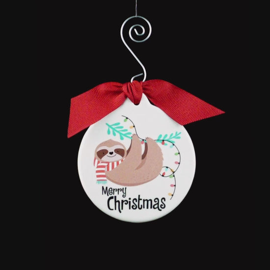 Handmade, porcelain Christmas ornament.  Large, round, 3.5 inch diameter.  Two times thicker than standard flat ornaments.  Includes your choice or ribbon color, a decorative hook and an optional personalized message on the back.